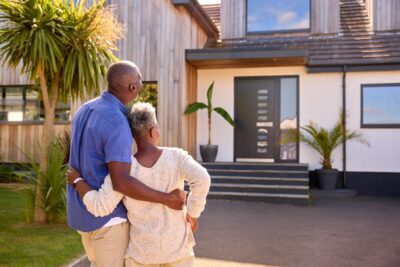 older couple looking at their dream home
